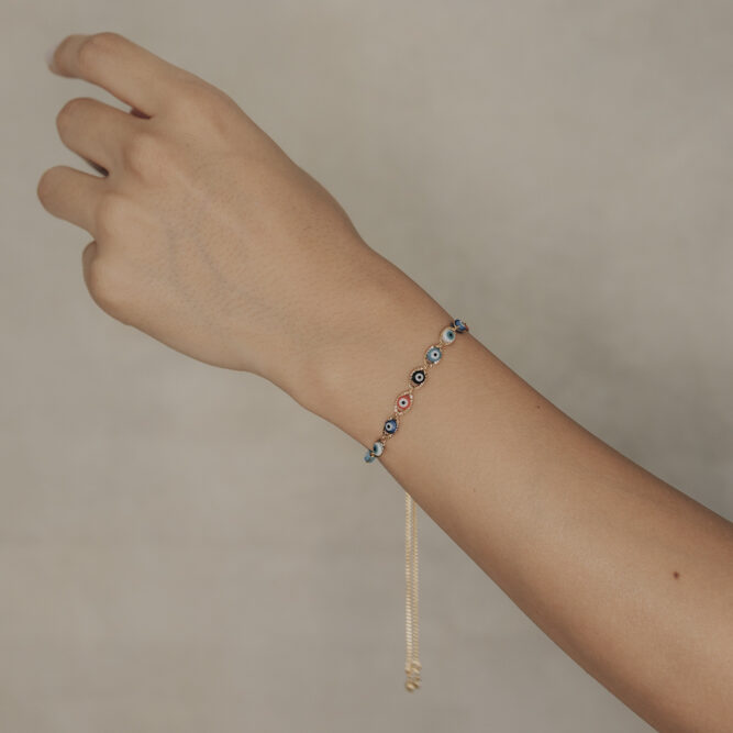 pulsera ojitos colores