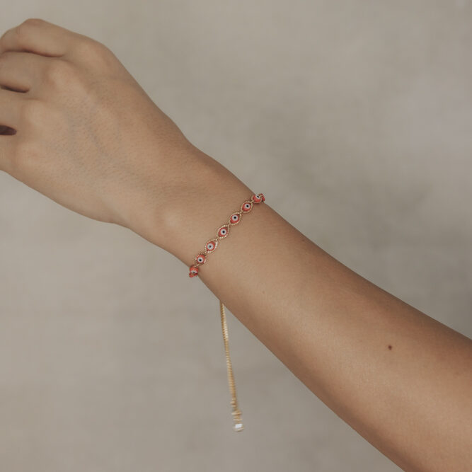 pulsera ojitos rojos